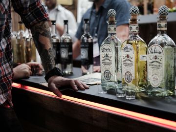 NEW YORK, NY - JUNE 12:  Bottles of alcohol are displayed at Bar Convent Brooklyn, an international bar & beverage trade show at the Brooklyn Expo Center on June 12, 2018 in the Brooklyn borough of New York City. An extension of Bar Convent Berlin, the trade show draws both premium brands and craft spirit brands for two days of discussions on new trends, techniques and products in the domestic and international markets. Attendees to the show can also participate in taste forums, demonstrations, keynote addresses and panel discussions with leading industry experts.  (Photo by Spencer Platt/Getty Images)