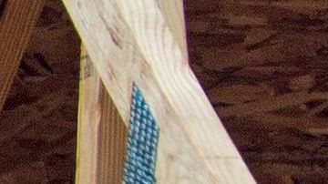 Workers complete the final phases of a roof on a new townhouse under construction September 7, 2012 in Ashburn, Virginia.    AFP PHOTO / Paul J. RICHARDS (Photo by Paul J. RICHARDS / AFP) (Photo by PAUL J. RICHARDS/AFP via Getty Images)