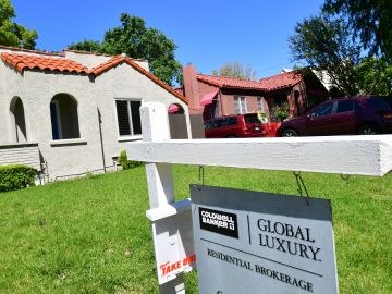 A for sale sign is seen near a house for sale in South Pasadena, California on April 24, 2020. - The coronavirus pandemic has worsened the US housing crisis as millions now unemployed must now figure out how to pay their monthly mortgages. (Photo by Frederic J. BROWN / AFP) (Photo by FREDERIC J. BROWN/AFP via Getty Images)