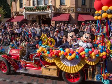 LAKE BUENA VISTA, FLA - NOVEMBER 18: In this handout image provided by Walt Disney World Resort, Disneyland guests and Cast Members celebrate Mickey Mouses 90th birthday, November 18, 2018, during a festive cavalcade down Main Street U.S.A at Disneyland park in Anaheim, California. Beginning in January 2019, Disneyland guests will be able to join the party with Get Your Ears On  a Mickey and Minnie Celebration featuring new entertainment, limited-time merchandise and food and beverage offerings. (Photo by Joshua Sudock/Disneyland Resort via Getty Images)