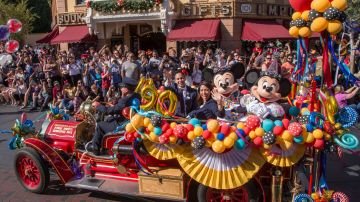 LAKE BUENA VISTA, FLA - NOVEMBER 18: In this handout image provided by Walt Disney World Resort, Disneyland guests and Cast Members celebrate Mickey Mouses 90th birthday, November 18, 2018, during a festive cavalcade down Main Street U.S.A at Disneyland park in Anaheim, California. Beginning in January 2019, Disneyland guests will be able to join the party with Get Your Ears On  a Mickey and Minnie Celebration featuring new entertainment, limited-time merchandise and food and beverage offerings. (Photo by Joshua Sudock/Disneyland Resort via Getty Images)