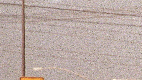 LOS ANGELES - JUNE 17:  Motorists wave as police cars pursue the Ford Bronco (white, R) driven by Al Cowlings, carrying fugitive murder suspect O.J. Simpson, on a 90-minute slow-speed car chase June 17, 1994 on the 405 freeway in Los Angeles, California. Simpson's friend Cowlings eventually drove Simpson home, with Simpson ducked under the back passenger seat, to Brentwood where he surrendered after a stand-off with police. (Photo credit should read MIKE NELSON/AFP via Getty Images)
