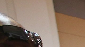 Cory Thames, with the city of Chicago human resources department, collects resumes from Job seekers as they enter a job fair being held at Kennedy-King College and hosted by the city of Chicago on November 9, 2012 in Chicago, Illinois. Thousands of people waited in line beginning at 3AM for the job fair which did not open the doors until 9AM. When the doors opened the line was about a half-mile long.  (Photo by Scott Olson/Getty Images)