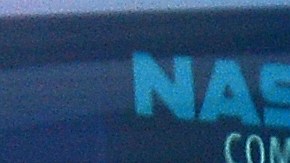 A Facebook logo is seen through the windows of the NASDAQ stock exchange as people walk by on Times Square in New York, May 17, 2012. Facebook is set to go public on May 18, 2012 and is likely to have an estimated market valuation of over 100 billion USD when its shares begin trading on the NASDAQ. AFP PHOTO/Emmanuel Dunand        (Photo credit should read EMMANUEL DUNAND/AFP/GettyImages)