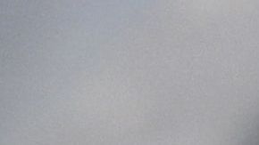 An employee checks the temperature of a visitor at the entrance of the annual book fair on the Red Square in downtown Moscow on June 6, 2020. - The open-air book fair is the first public event since the country eased lockdown measures taken to curb the spread of the COVID-19 pandemic, caused by the novel coronavirus. (Photo by Kirill KUDRYAVTSEV / AFP) (Photo by KIRILL KUDRYAVTSEV/AFP via Getty Images)