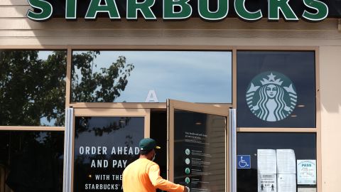 SAN RAFAEL, CALIFORNIA - JUNE 10: A customer enters a Starbucks Coffee store on June 10, 2020 in San Rafael, California. Starbucks announced plans to close 400 of its company owned cafes over the next 18 months as the coffee shop chain estimates losing over $3 billion due to the coronavirus COVID-19 pandemic. (Photo by Justin Sullivan/Getty Images)