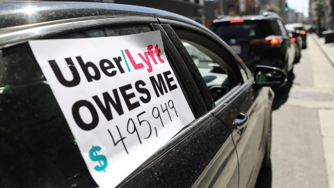 LOS ANGELES, CALIFORNIA - APRIL 16: Uber and Lyft drivers with Rideshare Drivers United and the
Transport Workers Union of America conduct a ‘caravan protest’ outside the California Labor Commissioner’s office amidst the coronavirus pandemic on April 16, 2020 in Los Angeles, California. The drivers called for California to enforce the AB 5 law so that they may qualify for unemployment insurance as the spread of COVID-19 continues. Drivers also called for receiving back wages they say they are owed. (Photo by Mario Tama/Getty Images)