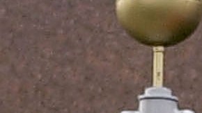 ATLANTA, GA - JANUARY 31:  A flag waves in the breeze outside Coca-Cola world headquarters January 31, 2003  in Atlanta, Georgia. Coca-Cola has announced plans to cut 1,000 workers as part of a massive reorganization of its North American operations. Of those jobs, about 500 will be pared from Atlanta. The move is the latest of many major changes at Coke, which has a new president and is pushing to integrate several operations - notably Coca-Cola North America, Coke Fountain and Minute Maid  (Photo by Erik S. Lesser/Getty Images)