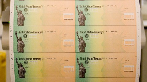 PHILADELPHIA - MAY 8: Economic stimulus checks are prepared for printing at the Philadelphia Financial Center May 8, 2008 in Philadelphia, Pennsylvania. One hundred and thirty million households are eligible to receive a tax rebate check under the $168 billion economic stimulus plan. (Photo by Jeff Fusco/Getty Images)