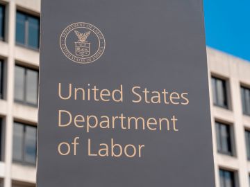 The US Department of Labor Building on March 26, 2020, in Washington, DC. - The economic shutdown caused by the coronavirus pandemic sparked an explosion of Americans filing for unemployment benefits, surging to 3.3 million last week -- the highest number ever recorded, the Labor Department reported March 26. The US Senate approved overnight a $2.2 trillion economic rescue package that includes an unprecedented expansion in unemployment benefits to try to cushion the blow until the pandemic is under control. (Photo by Alex Edelman / AFP) (Photo by ALEX EDELMAN/AFP via Getty Images)