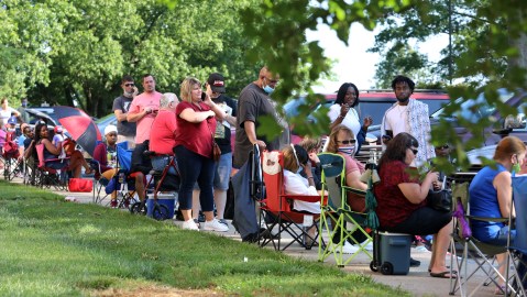 FRANKFORT, KY - JUNE 19: Hundreds of unemployed Kentucky residents wait in long lines outside the Kentucky Career Center for help with their unemployment claims on June 19, 2020 in Frankfort, Kentucky. (Photo by John Sommers II/Getty Images)