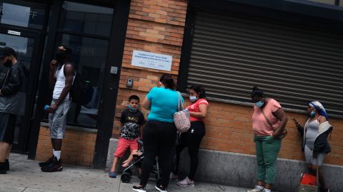 NEW YORK, NEW YORK - JULY 07: People wait in line for food assistance cards on July 07, 2020 in the Brooklyn borough of New York City. A report issued by the Center for New York City Affairs last week noted that the city's unemployment rate surged from an historic low of 3.4 percent in February to 18.3 percent in May, with the analysis pointing out that the rate would be an even higher 26 percent in May if unemployed workers who haven't looks for jobs during the pandemic were included. The May umployment rate is twice as high for Black, Latino and Asian New Yorkers as for White New Yorkers.  (Photo by Spencer Platt/Getty Images)