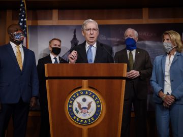 Senate Majority Leader Mitch McConnell flanked by (L to R) Sen. Tim Scott, R-SC,  Sen. James Lankford, R-OK, Sen. John Cornyn, R-TX, and Sen. Shelley Moore Capito, R-WV, speaks at a news conference to announce a Republican police reform bill  a news conference to announce that the Senate will consider police reform legislation, at the US Capitol on June 17, 2020 in Washington, DC. (Photo by Olivier DOULIERY / AFP) (Photo by OLIVIER DOULIERY/AFP via Getty Images)