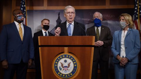 Senate Majority Leader Mitch McConnell flanked by (L to R) Sen. Tim Scott, R-SC, Sen. James Lankford, R-OK, Sen. John Cornyn, R-TX, and Sen. Shelley Moore Capito, R-WV, speaks at a news conference to announce a Republican police reform bill a news conference to announce that the Senate will consider police reform legislation, at the US Capitol on June 17, 2020 in Washington, DC. (Photo by Olivier DOULIERY / AFP) (Photo by OLIVIER DOULIERY/AFP via Getty Images)
