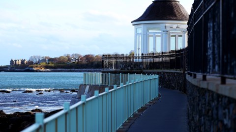 NEWPORT, RHODE ISLAND - MAY 09: A view of the Cliff Walk on May 09, 2020 in Newport, Rhode Island. Non-critical retail establishments began opening their doors with limited capacity as part of Phase 1 to reopen the state that was shut down due to the coronavirus (COVID-19) pandemic. Restaurants are now permitted to sell alcoholic mixed drinks with to go orders, and some state parks are welcoming visitors again. Gatherings are still limited to five people or fewer, and close contact businesses such as hair and nail salons are still shut down. Rhode Island has reported 10,000 confirmed coronavirus cases. (Photo by Maddie Meyer/Getty Images)