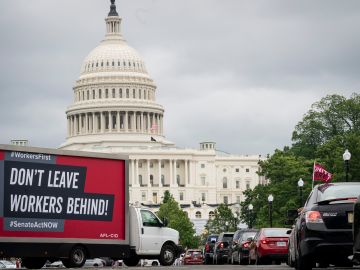 WASHINGTON, DC - JUNE 17: Protesters take part in the AFL-CIO Workers First Caravan for Racial and Economic Justice near the U.S. Capitol on June 17, 2020 in Washington DC. The caravan circled the U.S. Capitol and national mall while honking their car horns to bring attention to their cause. (Photo by Drew Angerer/Getty Images)