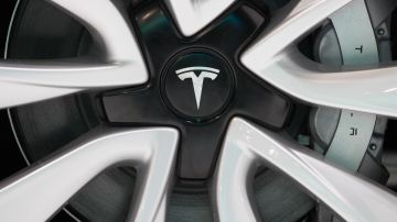 Illustration shows Tesla logo during the opening day of the 97th edition of the Brussels Motor Show, at Brussels Expo, on Friday 18 January 2019, in Brussels. BELGA PHOTO DIRK WAEM        (Photo credit should read DIRK WAEM/AFP via Getty Images)