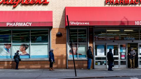 NEW YORK, NY - APRIL 14: People stand in line outside of Walgreens on Westchester Avenue on April 14, 2020 in the Bronx borough of New York City. New York Governor Andrew Cuomo said on Monday that "the worst is over," as he announced New York is joining six other states in planning how and when to safely reopen schools, businesses and workplaces. New York reportedly has over 200,000 confirmed cases of COVID-19 and 10,000 deaths. (Photo by David Dee Delgado/Getty Images)