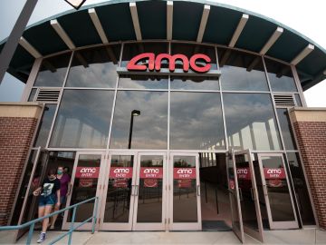 DENVER, COLORADO - AUGUST 20: Movie goers leave the AMC Highlands Ranch 24 on August 20, 2020 in Highlands Ranch, Colorado. AMC Theatres reopened more than 100 of its movie theaters across the United States today, with new safety precautions in place, for the first time since closing in March because of the coronavirus (COVID-19) pandemic. In celebration of its 100th anniversary, the world's largest theater chain is welcoming guests back with a "Movies in 2020 at 1920 Prices" promotion for one day by offering 15-cent tickets to classic and previously-released films and $5 concession items. Starting on August 21, older movies will be shown for $5 a ticket. According to AMC, enhanced cleaning and safety protocols include disinfecting theaters before each show, mandatory face coverings for employees and customers, upgraded air filtration systems where possible, and high-touch points cleaned throughout the day. Hand sanitizer and disinfectant wipes are available throughout the theaters, auditoriums are at 40 percent capacity or less, and concession menus have been simplified for shorter lines and quicker service. (Photo by Tom Cooper/Getty Images)