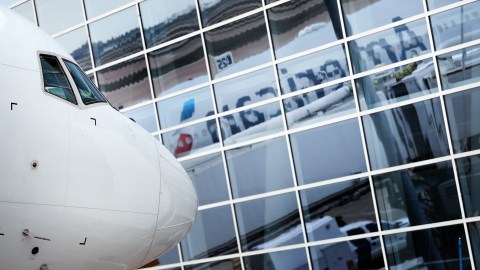 DALLAS, TEXAS - MARCH 20: A detail view as American Airlines fleet services employees prepare to load cargo pallets on a 777-300 at Dallas/Fort Worth International Airport (DFW) bound for Frankfurt Airport in Germany during the cornoavirus (COVID-19) pandemic on March 20, 2020 in Dallas, Texas. The first cargo-only flight departs from Dallas Fort Worth International Airport (DFW) tomorrow, March 20, landing at Frankfurt Airport (FRA) March 21. The Boeing 777-300 will operate two round trips between DFW and FRA over the course of four days, carrying only cargo and necessary flight personnel. This is the first scheduled cargo-only fight since 1984 when American retired the last of its Boeing 747 freighters. (Photo by Tom Pennington/Getty Images)