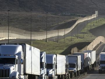 Trucks line up to cross the border with the United States at Otay Mesa Commercial Port of Entry in Tijuana, Mexico on January 22, 2018.
Negotiators from Canada, Mexico and the United States on Tuesday will kick off the sixth round of talks aimed at revamping the North American Free Trade Agreement (NAFTA) in Montreal. / AFP PHOTO / GUILLERMO ARIAS (Photo credit should read GUILLERMO ARIAS/AFP via Getty Images)