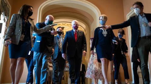 WASHINGTON, DC - JULY 30: Senate Majority Leader Mitch McConnell (R-KY) is swarmed by reporters as he leaves the Senate floor and walks to his office at the U.S. Capitol on July 30, 2020 in Washington, DC. Republicans and Democrats in the Senate remain in a stalemate as the the $600-per-week federal unemployment benefit in place due to the coronavirus pandemic is set to expire on Friday. (Photo by Drew Angerer/Getty Images)