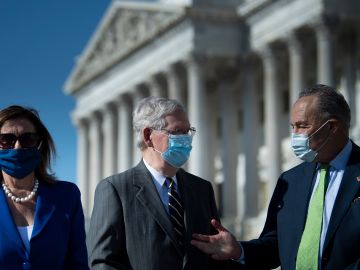 WASHINGTON, DC - JULY 29: Speaker of the House Nancy Pelosi (D-CA), Senate Majority Leader Senator Mitch McConnell (R-KY), and Senate Minority Leader Chuck Schumer (D-NY) speak after the casket with the remains of Rep. John Lewis (D-GA) is carried from the U.S. Capitol building July 29, 2020, in Washington, DC. After lying in state at the Capitol, the body of Lewis will go to Atlanta, Georgia where he will lie in repose at the State Capitol ahead of Thursday's funeral service. (Photo by Brendan Smialowski-Pool/Getty Images)