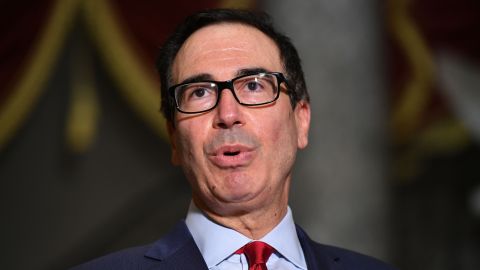 US Treasury Secretary Steve Mnuchin speaks to the media after meeting with the US Senate Minority Leader and House Speaker on coronavirus relief at the US Capitol in Washington, DC on August 7, 2020. - Democrats urged the White House to stick with negotiations on a new aid plan for Americans facing hardship due to the coronavirus pandemic, after Donald Trump said he is ready to bypass Congress to maintain emergency assistance. (Photo by Mandel NGAN / AFP) (Photo by MANDEL NGAN/AFP via Getty Images)
