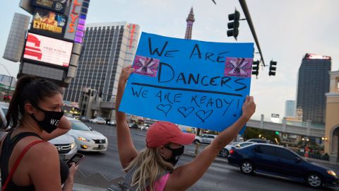 Events and entertainment workers gather in a protest to bring attention to their labor and unemployment on August 19, 2020 in Las Vegas, Nevada. - Entertainment and events have come to a halt during the COVID-19 pandemic highly impacting Las Vegass work force. (Photo by Bridget BENNETT / AFP) (Photo by BRIDGET BENNETT/AFP via Getty Images)