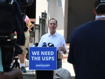 Representative Adam Schiff (D-Burbank) delivers a press conference outside a US Post Office in Burbank, California to discuss the negative impact of cuts in postal services, August 18, 2020. - Postmaster General Louis DeJoy announced August 18, 2020 that he will halt controversial cost-cutting initiatives at the US Postal Service until after the presidential election amid fears that the changes could delay election mail this fall in the middle of the coronavirus pandemic. (Photo by Robyn Beck / AFP) (Photo by ROBYN BECK/AFP via Getty Images)