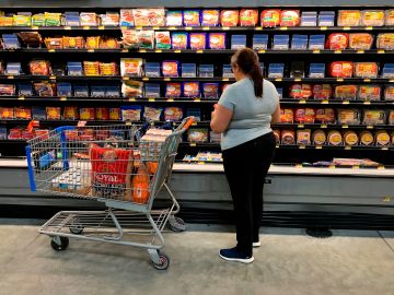 Residents buy supplies at a Walmart in West Miami on August 30, 2019, in preparation for Hurricane Dorian. - Dorian was on a collision course with Florida on Friday as residents stocked up on food and water and battened down their homes to ride out the storm and others prepared to evacuate. Weather forecasters said Dorian, currently a Category 2 hurricane, could strengthen into a powerful Category 4 storm before it makes landfall but there was a great amount of uncertainty about where it would hit. Dorian is forecast to make landfall September 2. (Photo by Eva Marie UZCATEGUI / AFP) (Photo credit should read EVA MARIE UZCATEGUI/AFP via Getty Images)
