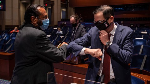 WASHINGTON, DC - JUNE 30: Rep. Al Green (D-TX) and U.S. Secretary of the Treasury Steven Mnuchin greet each other after testifying before the House Financial Services Committee on Capitol Hill on June 30, 2020 in Washington, DC. Federal Reserve Chairman Jerome Powell and Treasury Secretary Steven Mnuchin testified on their agencies’ response to the coronavirus pandemic. (Photo by Tasos Katopodis/Getty Images)