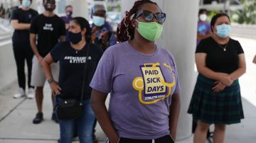 FORT LAUDERDALE, FLORIDA - AUGUST 13:  Demonstrators including unemployed airport workers, the Black Lives Matter Alliance of Broward and other supporters ask that  Delta Airlines contractor, Eulen America, who the demonstrators say received $25 million from the CARES Act, hire back their unemployed Fort Lauderdale-Hollywood International Airport workers on August 13, 2020 in Fort Lauderdale, Florida. They are also asking that U.S. Senators pass the HEROES Act that provides PPE, essential pay and extended unemployment benefits for essential workers. (Photo by Joe Raedle/Getty Images)