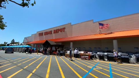 People wait in line to enter The Home Depot in Marina Del Rey, California on May 22, 2020, amid the novel coronavirus pandemic. (Photo by Chris DELMAS / AFP) (Photo by CHRIS DELMAS/AFP via Getty Images)