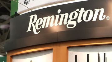 DALLAS, TX - MAY 05:  Attendees look at a display of Remington shotguns during the NRA Annual Meeting & Exhibits at the Kay Bailey Hutchison Convention Center on May 5, 2018 in Dallas, Texas.  The National Rifle Association's annual meeting and exhibit runs through Sunday.  (Photo by Justin Sullivan/Getty Images)