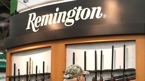 DALLAS, TX - MAY 05:  Attendees look at a display of Remington shotguns during the NRA Annual Meeting & Exhibits at the Kay Bailey Hutchison Convention Center on May 5, 2018 in Dallas, Texas.  The National Rifle Association's annual meeting and exhibit runs through Sunday.  (Photo by Justin Sullivan/Getty Images)