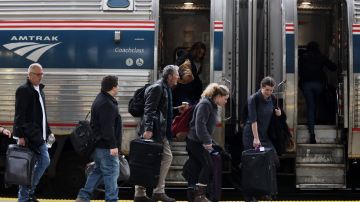 WASHINGTON, DC - NOVEMBER 27:  Passengers wait to board an Amtrak train November 27, 2019 at Union Station in Washington, DC. The Wednesday before Thanksgiving is expected to be one of the busiest travel day of the year as Americans travel to celebrate the holiday with their loved ones.  (Photo by Alex Wong/Getty Images)