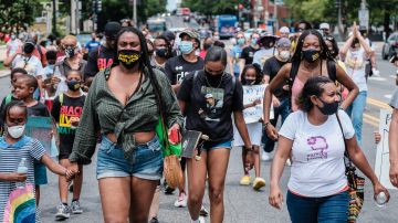 WASHINGTON, DC - JUNE 27: Demonstrators march to support Black Lives Matter during the Black Mamas March a protest against police brutality and racial inequality in the aftermath of the death of George Floyd on June 27, 2020 in Washington, DC. Demonstrators took part to voice their support for racial equality and to honour the memory of George Floyd, whose death at the hands of police in Minneapolis sparked protests worldwide. (Photo by Michael A. McCoy/Getty Images)