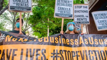 Renters and housing advocates attend a protest to cancel rent and avoid evictions in front of the court house amid Coronavirus pandemic on August 21, 2020, in Los Angeles, California. (Photo by VALERIE MACON / AFP) (Photo by VALERIE MACON/AFP via Getty Images)