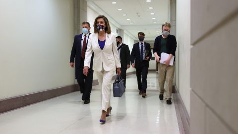 WASHINGTON, DC - OCTOBER 01: Speaker of the House Nancy Pelosi (D-CA) arrives for her weekly news conference in the House Visitors Center at the U.S. Capitol on October 01, 2020 in Washington, DC. Pelosi met with Treasury Secretary Steven Mnuchin on Wednesday in an unsuccessful effort to negotiate with the Trump Administration on coronavirus economic relief legislation.  (Photo by Chip Somodevilla/Getty Images)