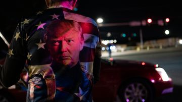 WASHINGTON, DC - OCTOBER 3: Supporters of U.S. President Donald Trump rally outside Walter Reed National Military Medical Center on October 3, 2020 in Bethesda, Maryland. Trump arrived at the hospital yesterday after testing positive for COVID-19. (Photo by Alex Edelman/Getty Images)