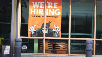 MIAMI, FLORIDA - SEPTEMBER 04: A "We're Hiring" sign is seen in a store front window on September 04, 2020 in Miami, Florida. The Bureau of Labor Statistics released a report today that shows the unemployment rate fell to 8.4 percent last month, down from a COVID-19 pandemic peak of 14.7 percent in April. (Photo by Joe Raedle/Getty Images)