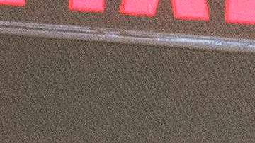 Travelers wait for their luggage at Newark International Airport on November 21, 2020 in Newark, New Jersey. - Current US numbers -- more than a quarter of a million deaths have been reported -- have alarmed authorities enough to advise that people stay home for the November 26 Thanksgiving holiday, when Americans usually travel to be with their families. (Photo by Kena Betancur / AFP) (Photo by KENA BETANCUR/AFP via Getty Images)