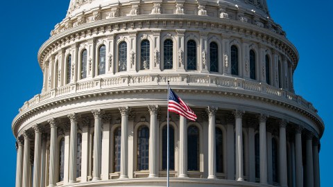 WASHINGTON, DC - NOVEMBER 06: The American flag flies at the U.S. Capitol on November 6, 2020 in Washington, DC. The 2020 presidential race between incumbent U.S. President Donald Trump and Democratic nominee Joe Biden is still too close to call with outstanding ballots in a number of states including Georgia. (Photo by Al Drago/Getty Images)