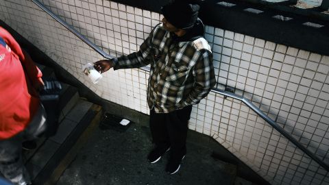 NEW YORK, NEW YORK - OCTOBER 17: A man panhandles in the the South Bronx on October 17, 2020 in New York City. The Bronx, a borough which has long struggled with poverty and neglect, has been especially impacted by the COVID-19 pandemic. The official unemployment rate in the Bronx is 21% while the unofficial number is presumed to be almost twice that. With many residents unable to afford health care and being home to a significant amount of front-line workers, the Bronx has the highest COVID-19 death rate in New York City. (Photo by Spencer Platt/Getty Images)
