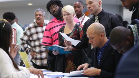 LOS ANGELES, CALIFORNIA - MARCH 05: Job seekers meet with recruiters at a job fair hosted by the Los Angeles Mission on March 05, 2020 in Los Angeles, California. The annual event, located in Skid Row, featured over 35 Los Angeles based employers. (Photo by Mario Tama/Getty Images)