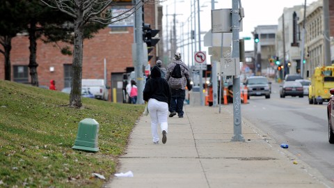KANSAS CITY, MO - MARCH 11:  Students walk down the street after leaving Westport High School on March 11, 2010 in Kansas City, Missouri. The High School is among 29 in a district of 61 schools that will close due to the new budget plan that is making the cuts to ward off bankruptcy.  (Photo by G. Newman Lowrance/Getty Images)