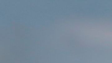 Supporters of US President Donald Trump rally outside the "Latinos for Trump Roundtable" event at Trump National Doral Miami golf resort in Doral, Florida, on September 25, 2020. (Photo by Marco BELLO / AFP) (Photo by MARCO BELLO/AFP via Getty Images)