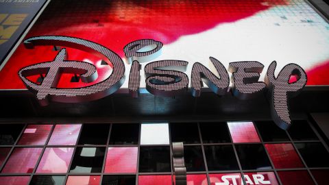 NEW YORK, NY - DECEMBER 14: The Disney logo is displayed outside the Disney Store in Times Square, December 14, 2017 in New York City. The Walt Disney Company announced on Thursday morning that it had reached a deal to purchase most of the assets of 21st Century Fox. The deal has a total value of around $66 billion, with Disney assuming $13.7 billion of Fox's net debt. (Photo by Drew Angerer/Getty Images)