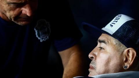 BUENOS AIRES, ARGENTINA - MARCH 07: Diego Armando Maradona head coach of Gimnasia y Esgrima La Plata sits on the bench before a match between Boca Juniors and Gimnasia y Esgrima La Plata as part of Superliga 2019/20 at Alberto J. Armando Stadium on March 7, 2020 in Buenos Aires, Argentina. (Photo by Marcos Brindicci/Getty Images)